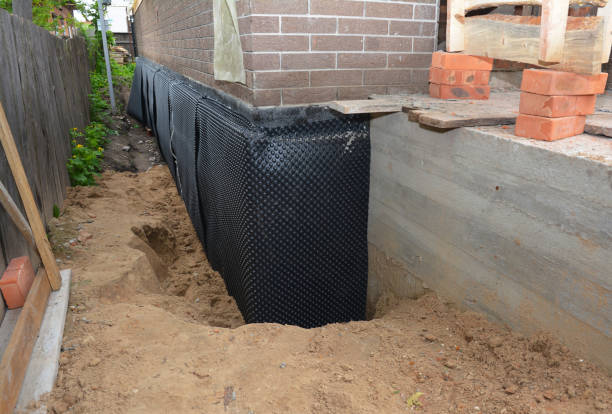 Happy homeowners after waterproofing job in Allenwood